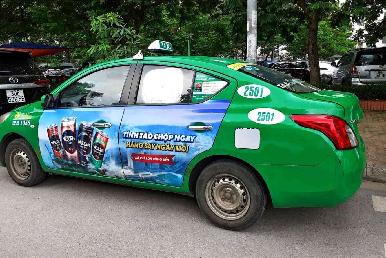 quang cao 4 canh tren taxi 1