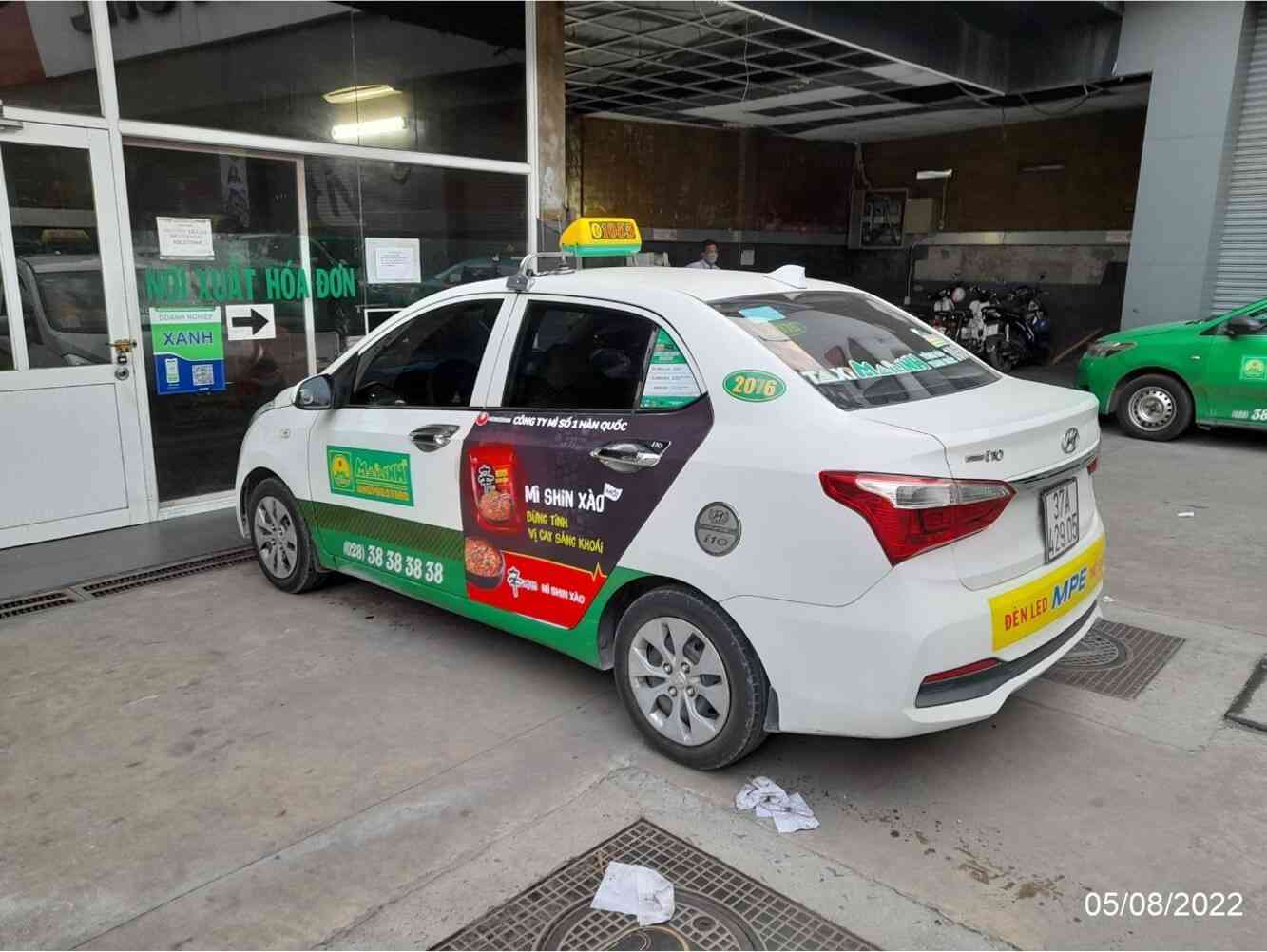 quang cao tren xe taxi 19 1